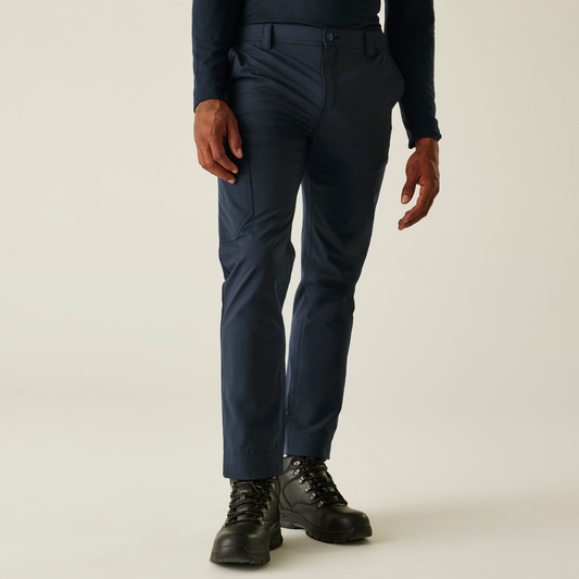 Model wearing the Regatta Pro Men’s Action Stretch Trousers in Navy, front view