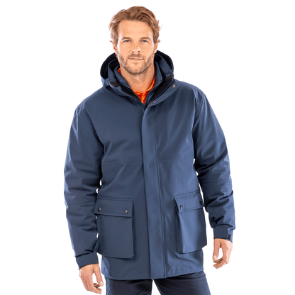 Model wearing the Result Recycled 3-In-1 Padded Jacket in Navy, front view, zipped up