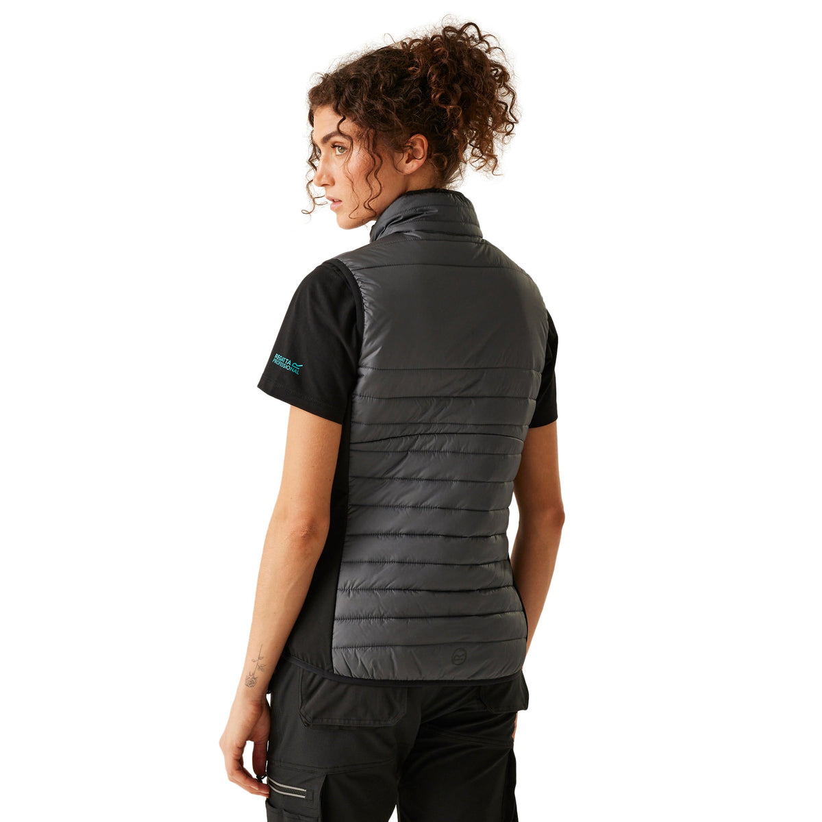 Model wearing the Regatta Ada Ladies Hybrid Bodywarmer in Seal Grey and Black, back view