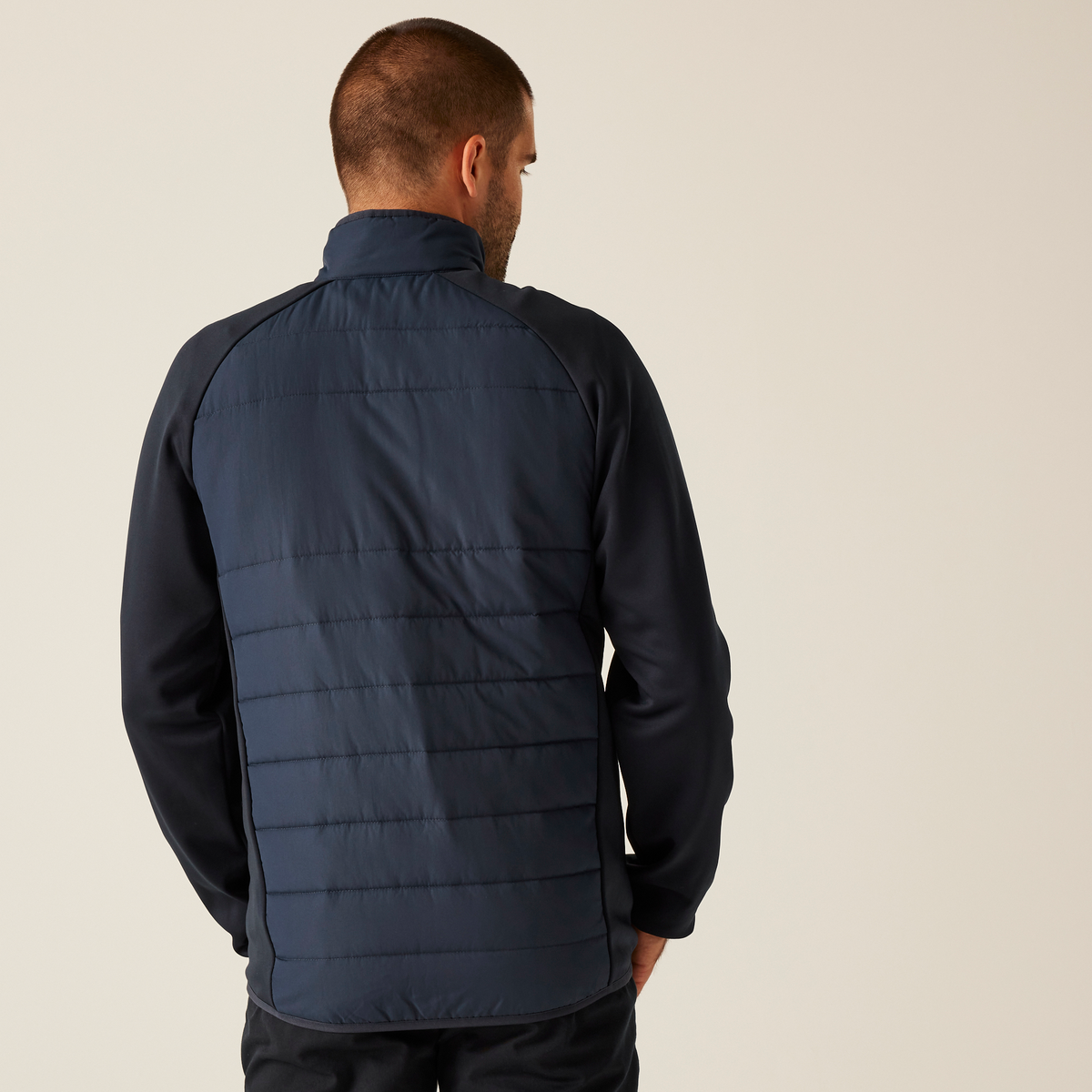 Model wearing the Regatta Essential Men's Hybrid Jacket in Navy, back view