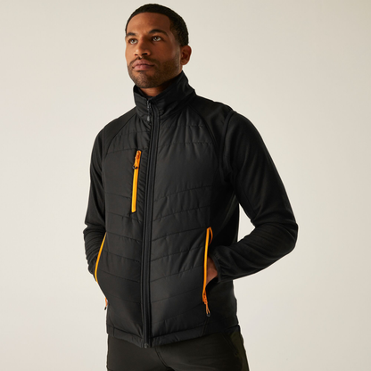 Model wearing the Regatta Pro Men’s Universal Bodywarmer in Black Orange Pop, front view