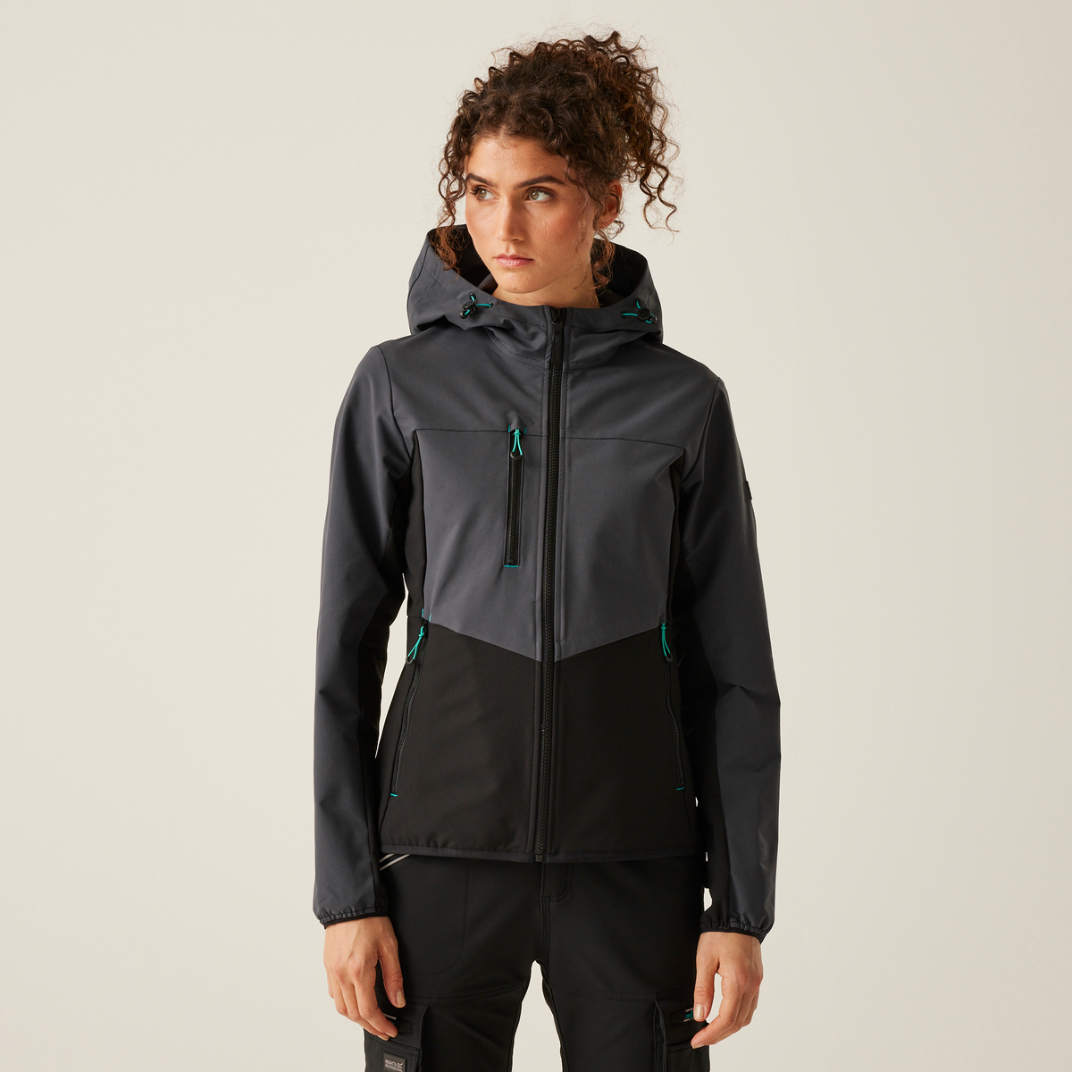 Model wearing the Regatta Ada Ladies Stretch Softshell Jacket in Seal Grey and Black, front view