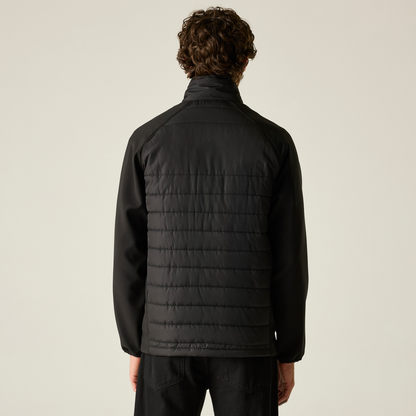 Model wearing the Regatta Pro Men’s Universal Jacket in Black Orange Pop, back view