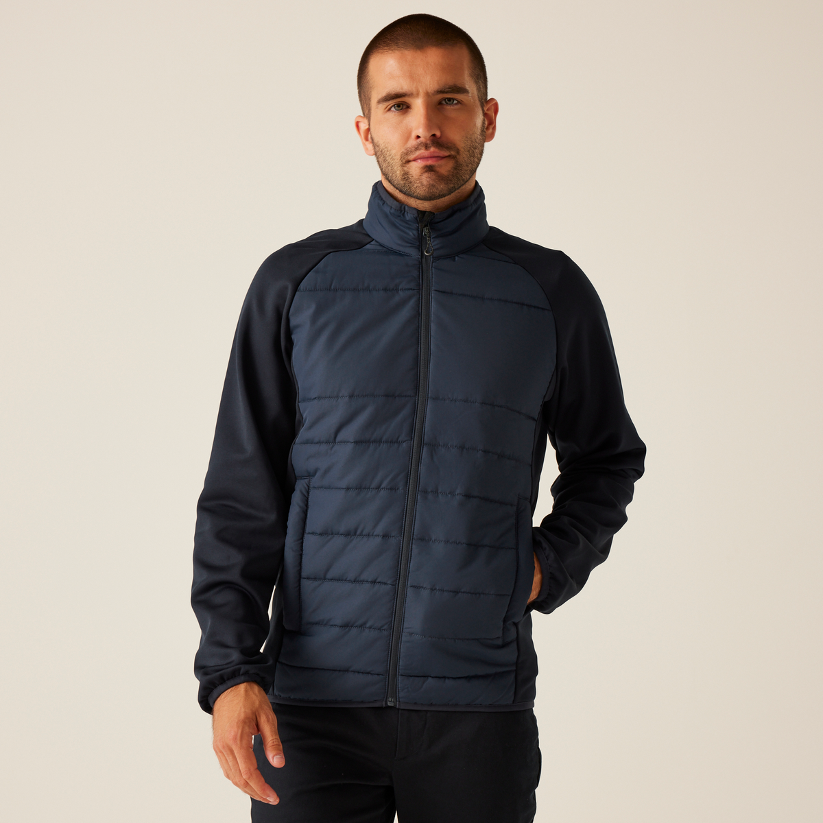 Model wearing the Regatta Essential Men's Hybrid Jacket in Navy, front view