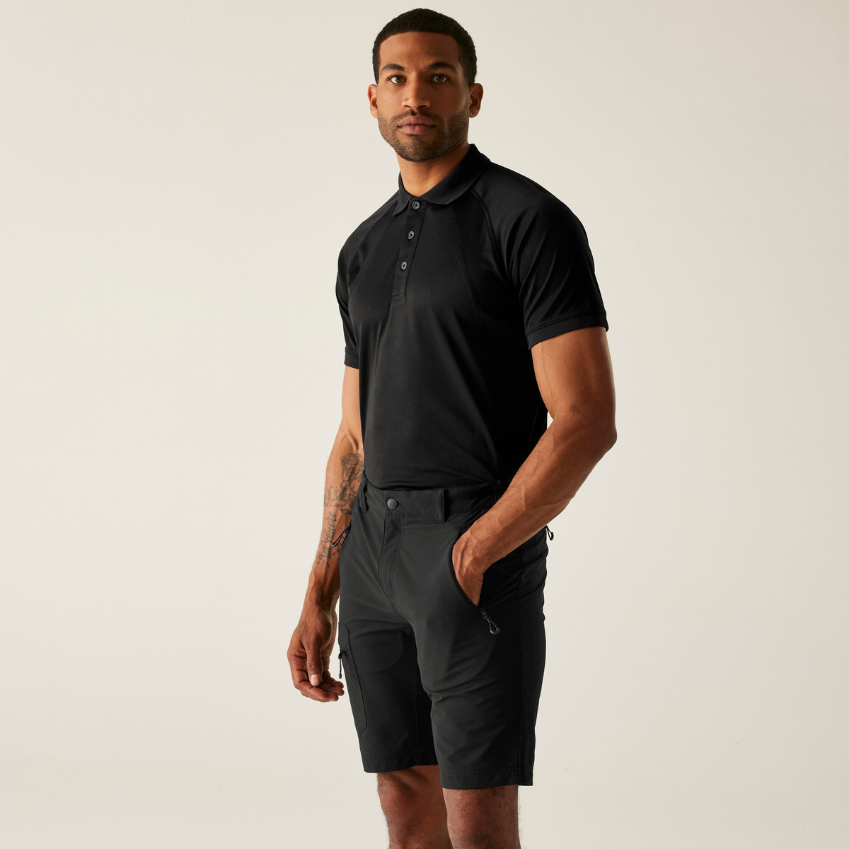 Model wearing the Regatta Prolite Men’s Stretch Shorts in Black, front view