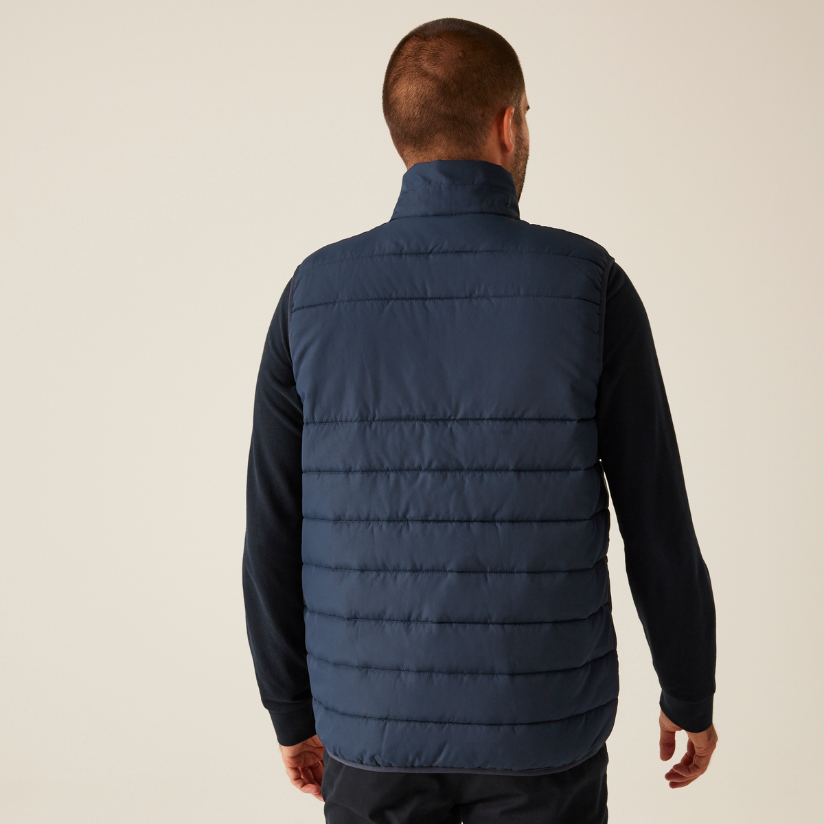 Model wearing the Regatta Essential Men's Thermal Bodywarmer in Navy, back view