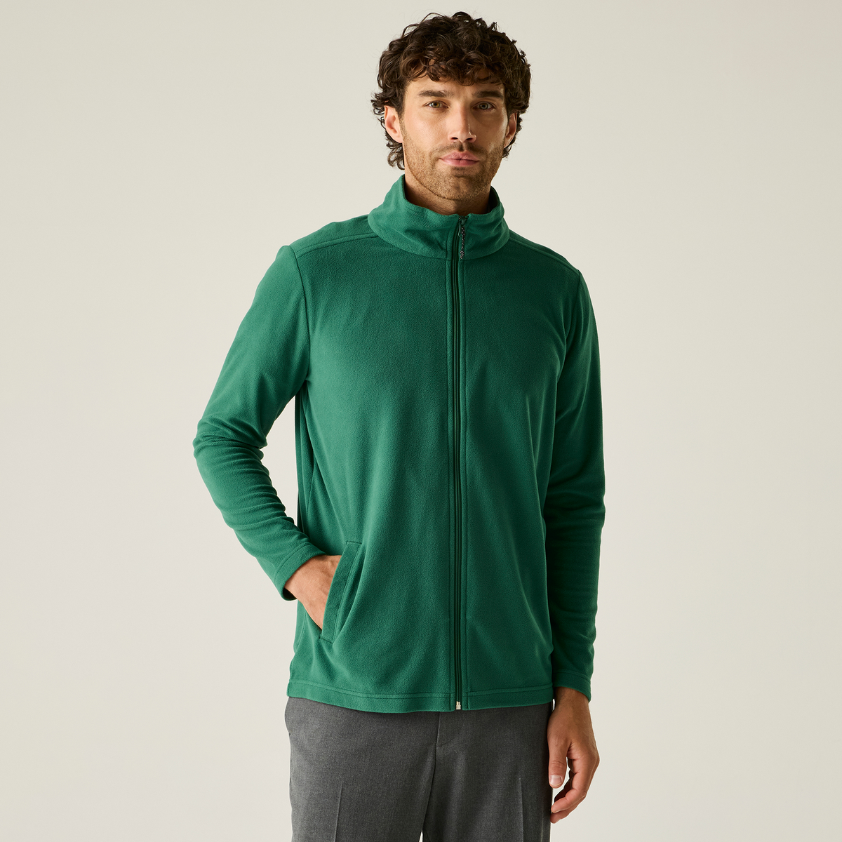 Model wearing the Regatta Pro Men’s Ultra Light Fleece Jacket in Bottle Green, front view