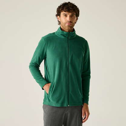 Model wearing the Regatta Pro Men’s Ultra Light Fleece Jacket in Bottle Green, front view