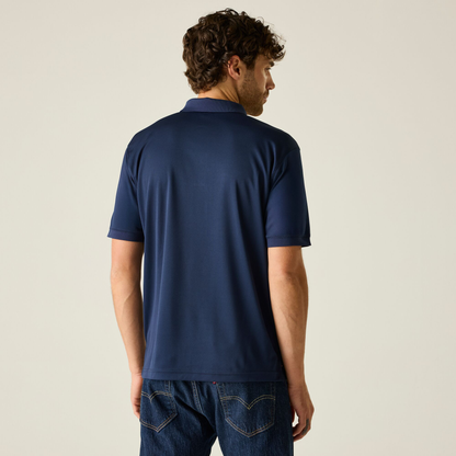 Model wearing the Regatta Recycle.Me Unisex Pique Polo Shirt in Navy, back view