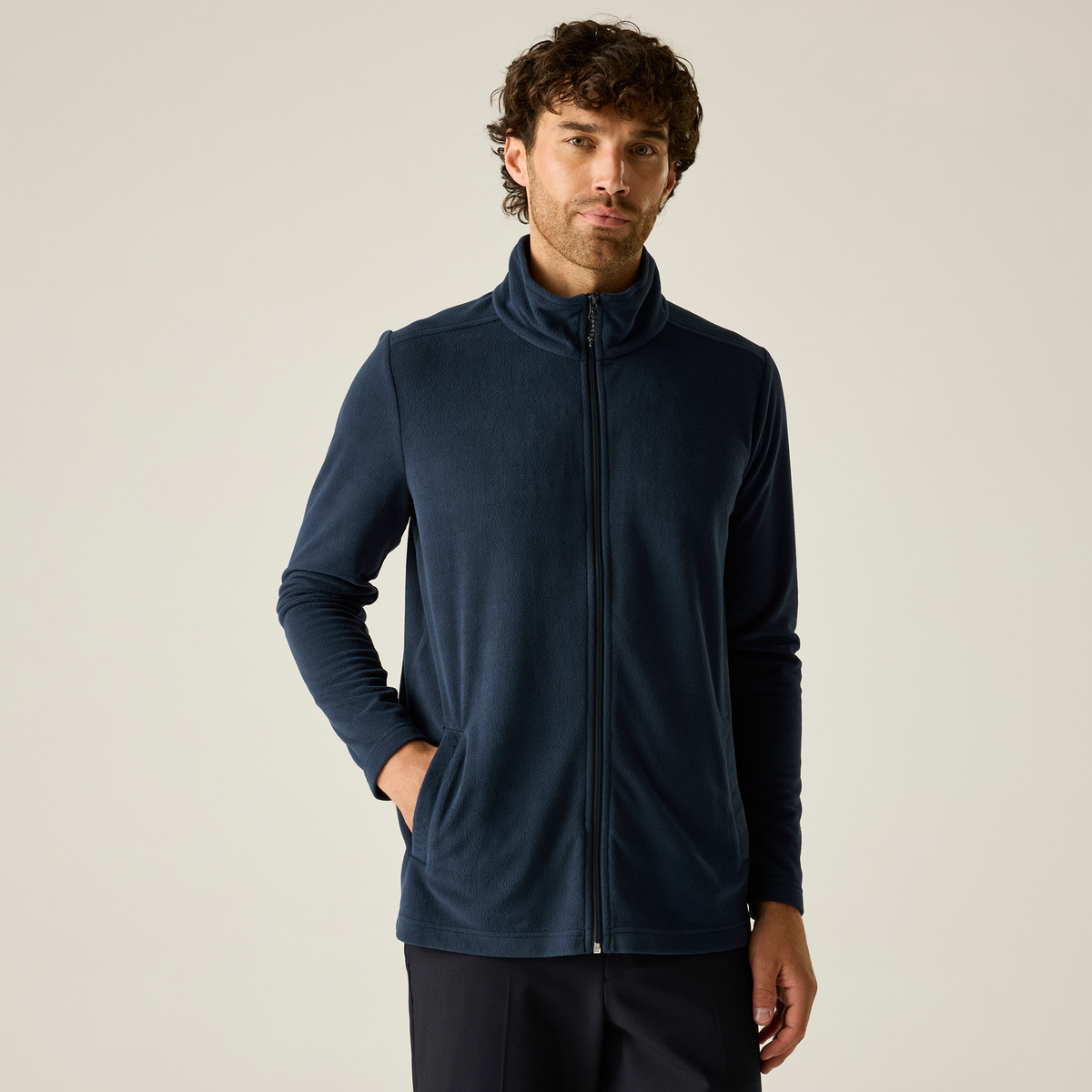 Model wearing the Regatta Pro Men’s Ultra Light Fleece Jacket in Navy, front view