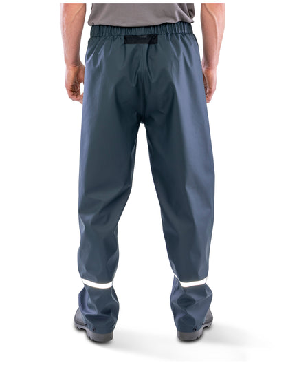 Model wearing the Result Prism Waterproof Trouser in Navy, back view