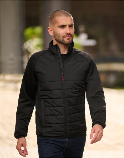 Man wearing the Regatta Essential Men's Hybrid Jacket in Black, walking outdoors