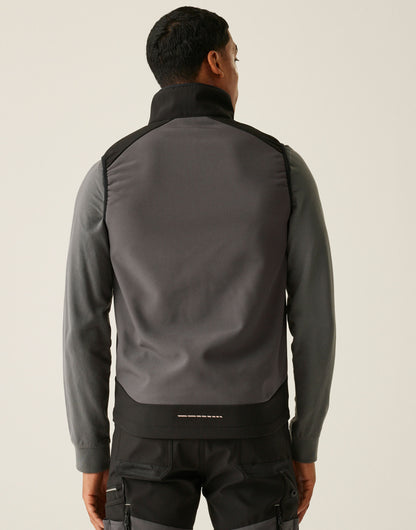 Model wearing the Regatta 4TEX Men's Stretch 3-Layer Softshell Bodywarmer in Slate Grey and Black, back view