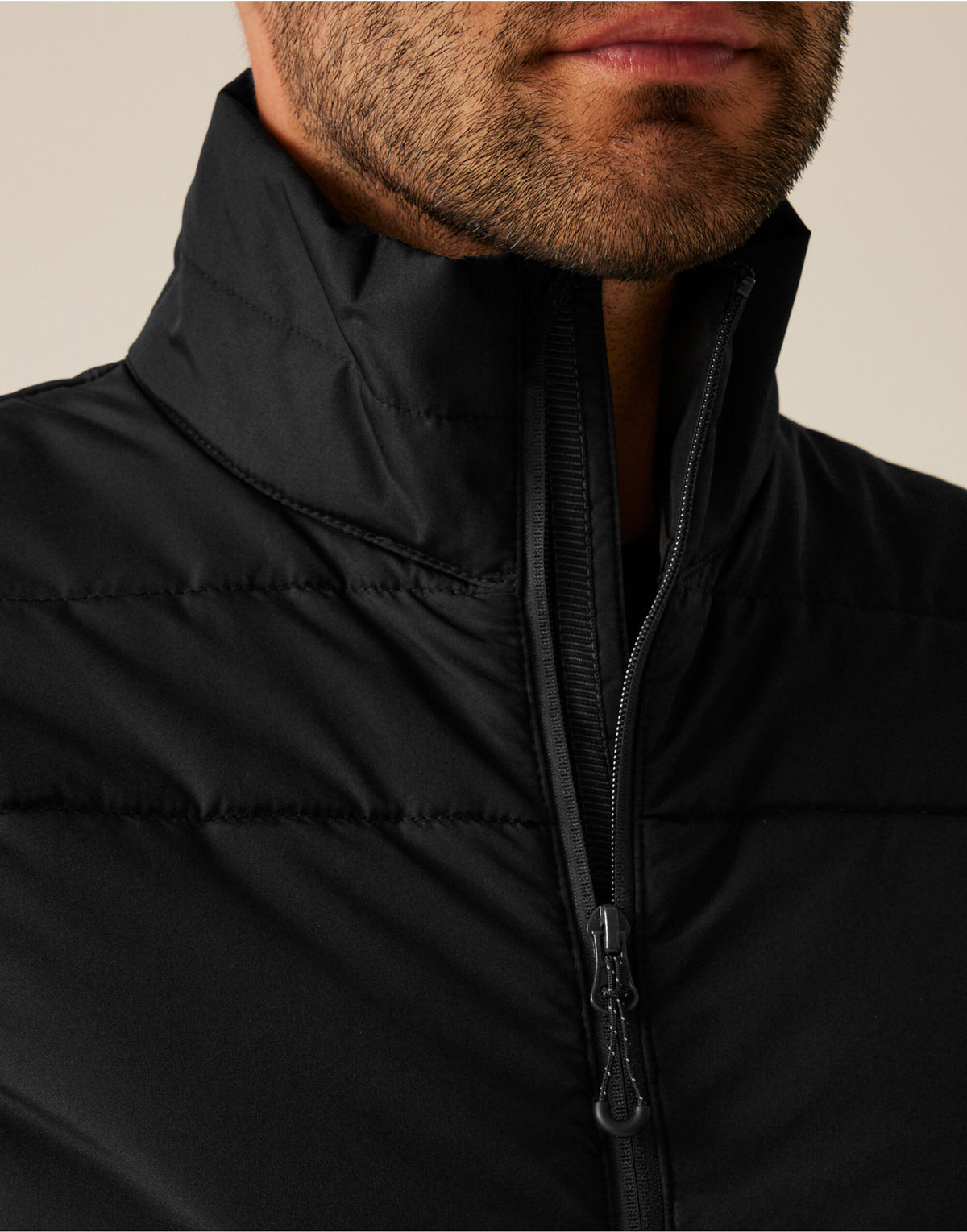 Close-up of the collar and zip of the Regatta Essential Men's Thermal Bodywarmer in Black