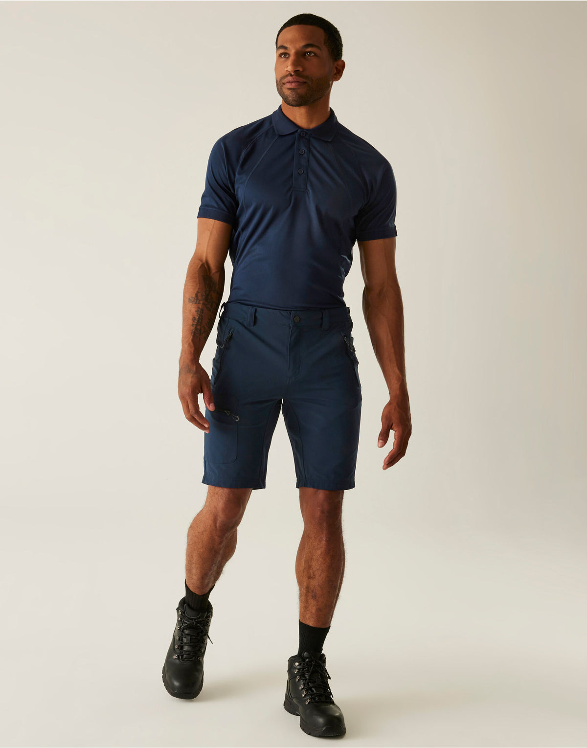 Model wearing the Regatta Prolite Men’s Stretch Shorts in Navy, front view, full length
