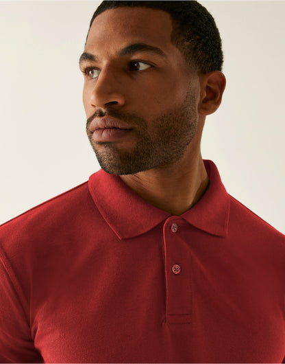 Model wearing the Regatta Pro Men’s 50/50 Pique Polo Shirt in Red, close-up of the collar