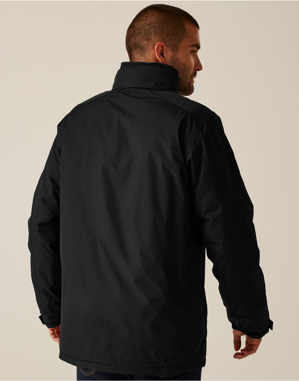 Model wearing the Regatta Dover Men's Parka in Black, back view