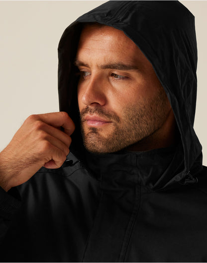 Model wearing the Regatta Dover Men's Parka in Black, close-up, hood up