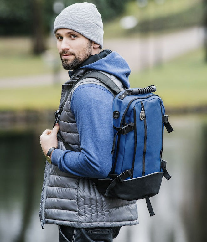 Backpack with adjustable discount straps